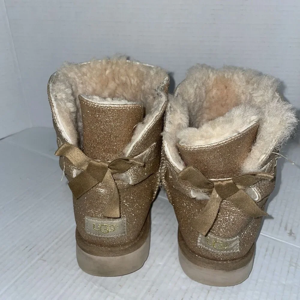 UGG Boots Women's Size 9 Gold Classic Short Bows Sparkle Shearling Mini Bailey - Picture 9 of 13